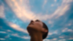 Person Looking at Sky
