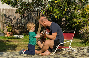 Decorative Image: Father with child talking - outdoors