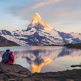 Sunset in the mountains with lake
