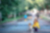 Child walking dog