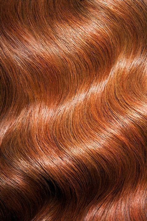 Cheveux roux ondulés