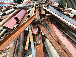 High Angle View Of Rusty Metal Heap At Junkyard