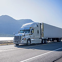 Truck Driving by Lake