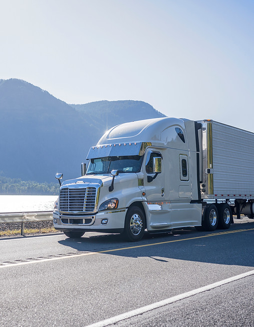 Truck Driving by the Lake