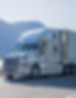 Truck Driving by Lake