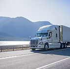 Truck Driving by Lake