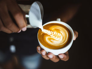 Barista making coffee