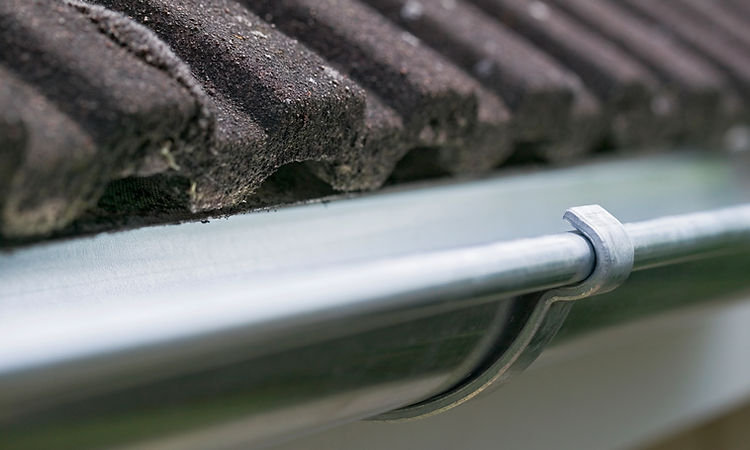 Guttering on the side of a house roof