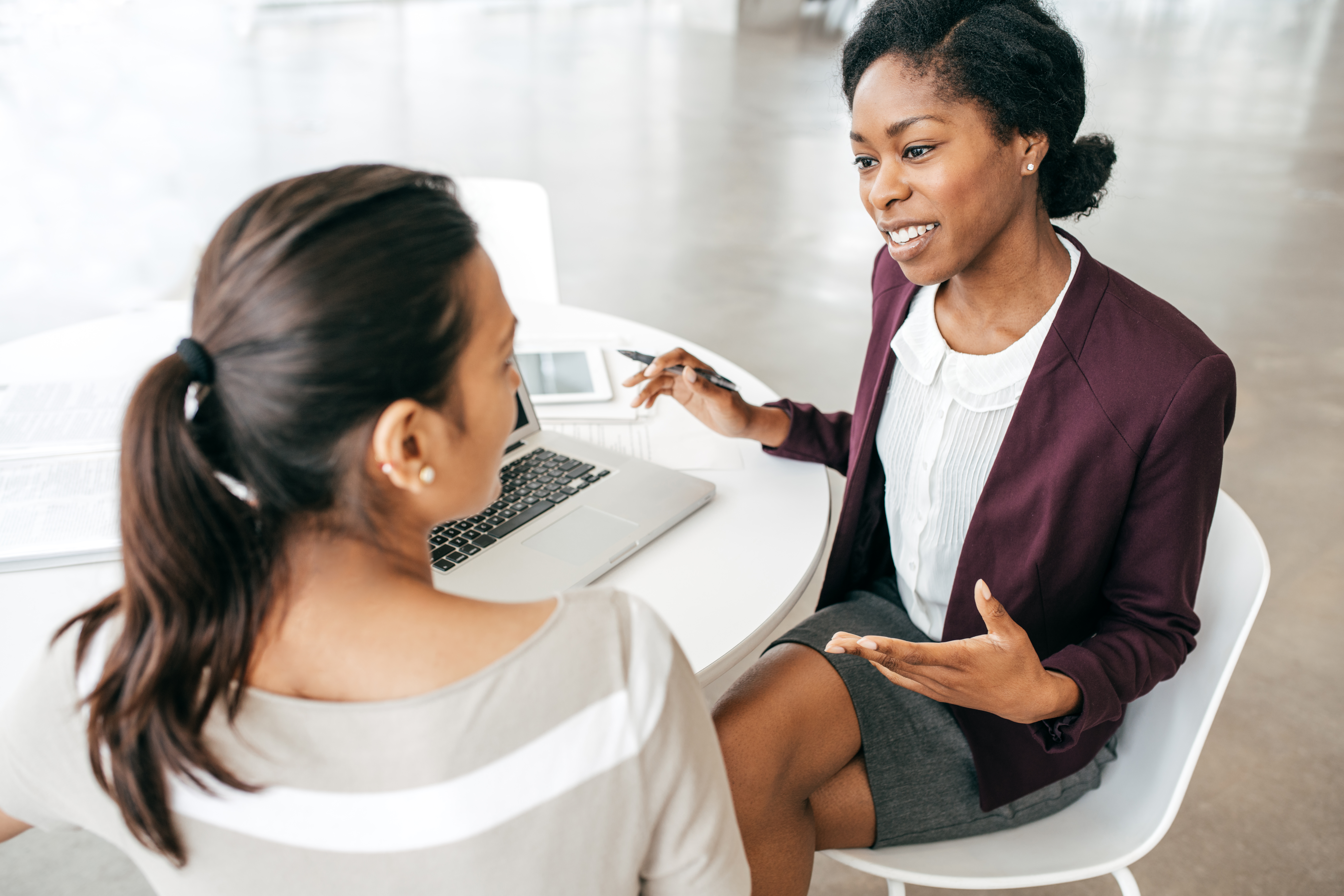 Two people discussing on-demand staffing