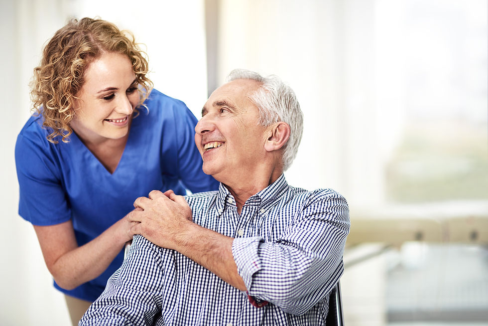 a female carer talking to her patient in the nursing home