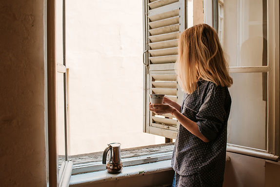 Woman Holding Cup