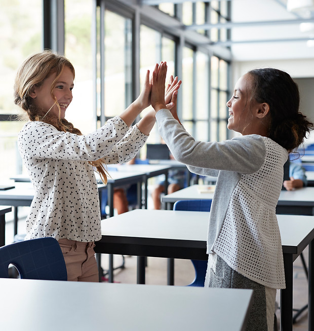 Students High-Fiving
