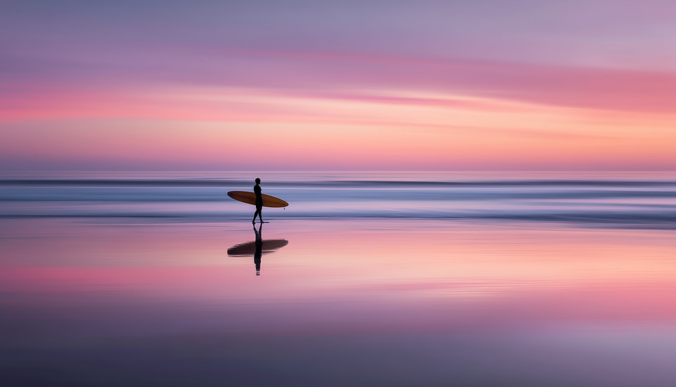 Surfer At Sunset