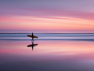 Surfer At Sunset