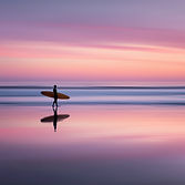 Surfer At Sunset