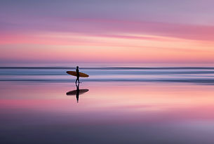 Surfer At Sunset
