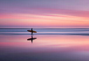 Surfer At Sunset