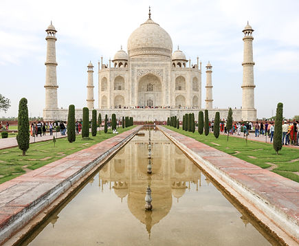Indian architecture called the Taj Mahal. Visitors gather around the Taj Mahal in Agra, India, a white marble mausoleum built by Mughal emperor Shah Jahan in memory of his third wife, Mumtaz Mahal, who died in childbirth in 1631. The construction of the Taj Mahal began in 1632 and was completed in 1653, with an estimated cost of over 32 million rupees. The Taj Mahal is considered one of the most beautiful buildings in the world and is a UNESCO World Heritage Site.