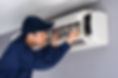 Technician Repairing Air Conditioner