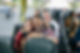 A mature couple taking a selfie with each other as they travel together on a bus