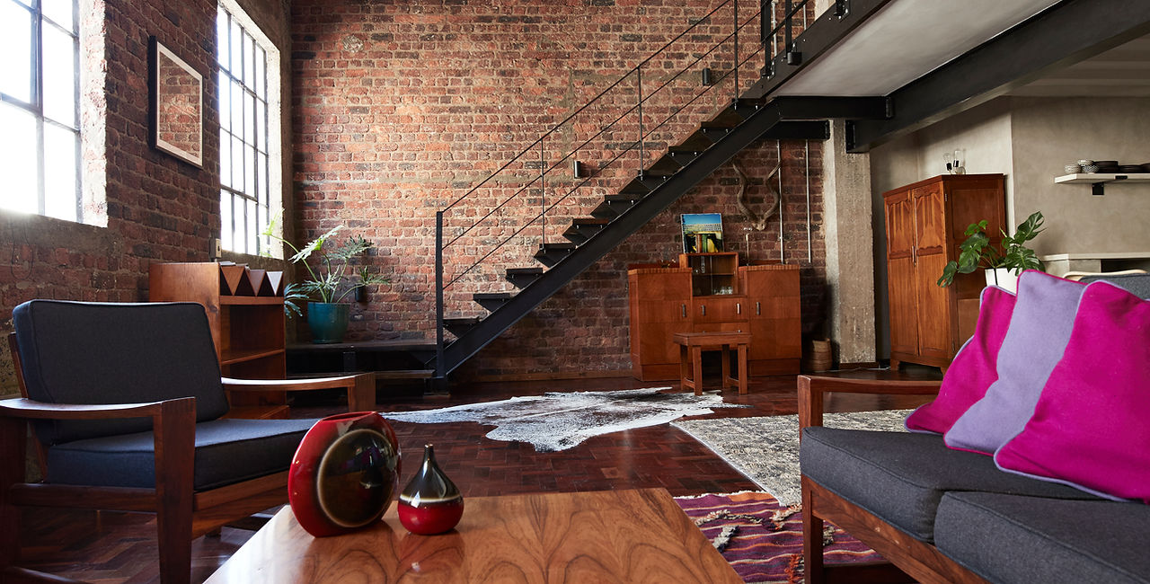Wooden Furniture and Brick Wall