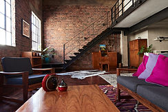 Wooden Furniture and Brick Wall