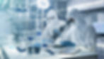 Scientists in laboratory gear