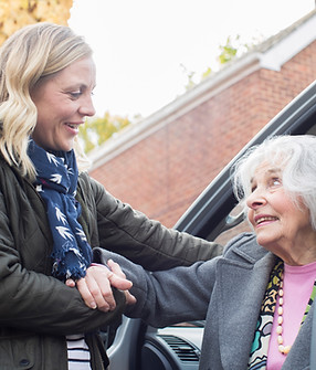Assisting Elderly Woman