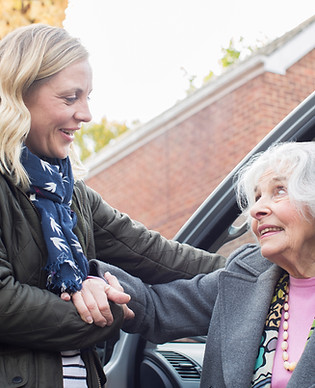 Assisting Elderly Woman