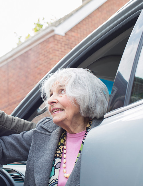 Assisting Elderly Woman