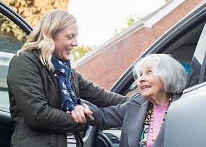 Assisting Elderly Woman