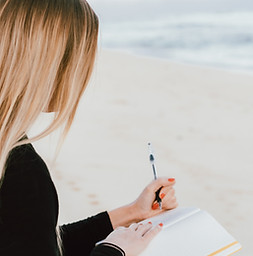Woman Writing Beach