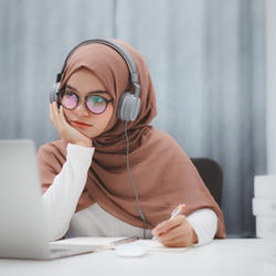 Student Looking at Laptop