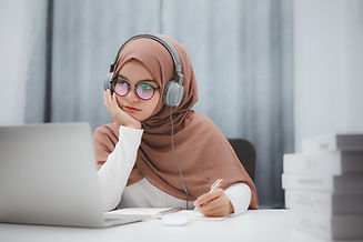 Student Looking at Laptop