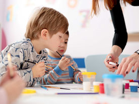 Clinician observing a child during an early autism assessment at Retrieve Mind Poly Clinic.