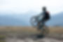 Mountain Biker Performs Wheelie