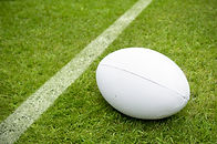 rugby ball near try line on rugby pitch with copy space