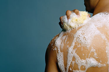Person washing their back
