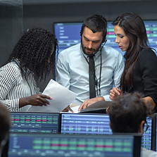 A team discussion at a trading room