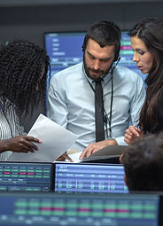 Team Analyzing Reports