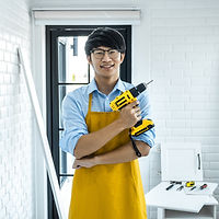 Man Holding Drill