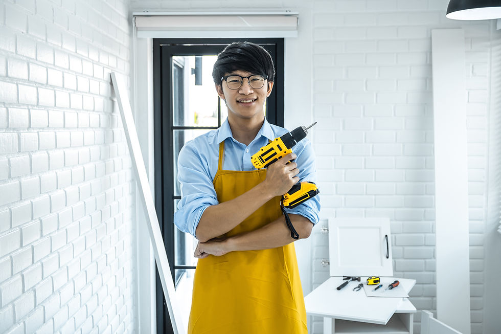 Man holding drill symbolizing getting a skill and job during recovery