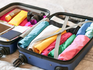 Packing a suitcase for a summer holiday