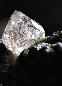 Raw crystal on rock
