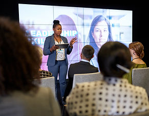 Woman conducting leadership presentation