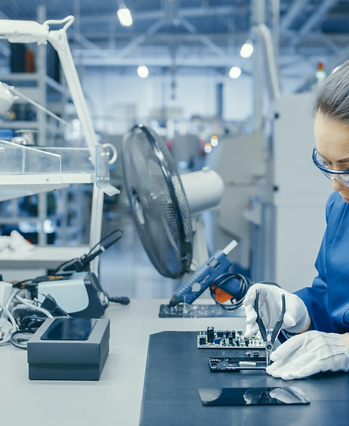 Woman Fixing Electronics