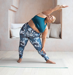 fat yogi in triangle pose