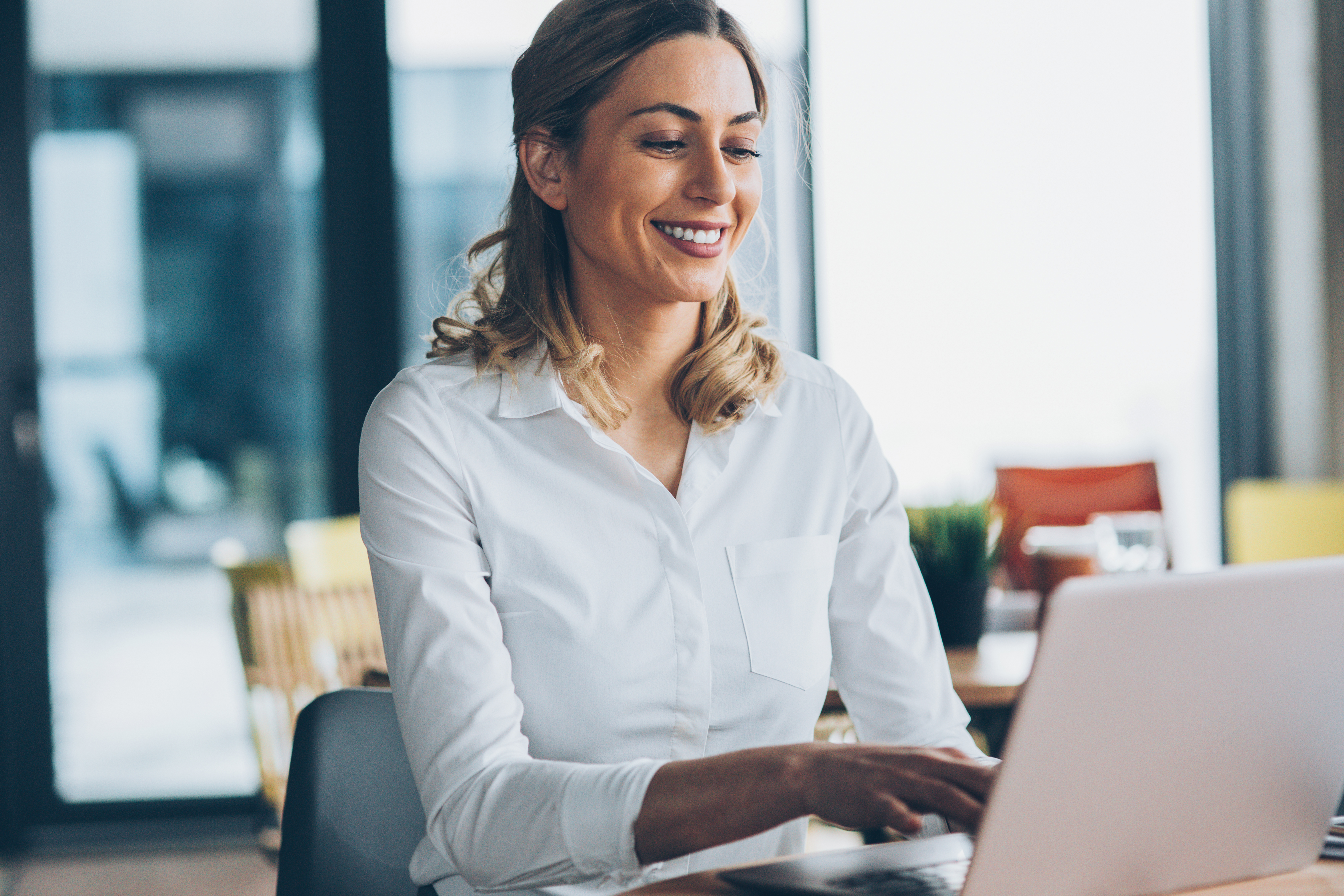 Woman Using Laptop