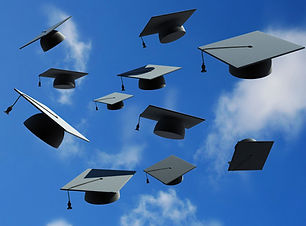 Graduation Caps in Sky