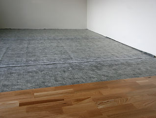 Laying down a wooden laminated floor